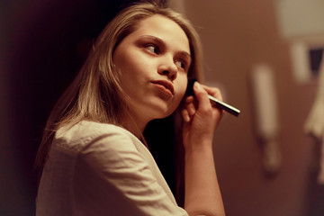 Obraz premium beautiful young woman at home in the apartment