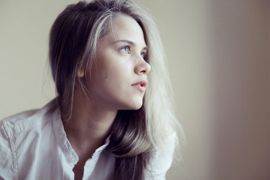 Bright Portrait Of Blond In High Key