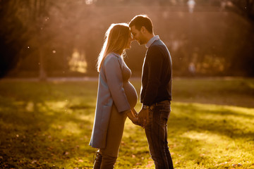 Happy couple in the autumn park