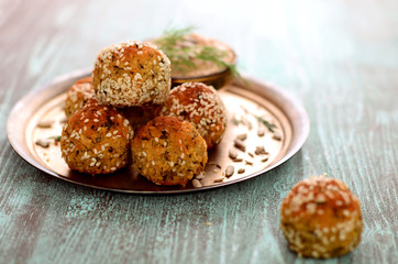 falafel with salad on copper plate