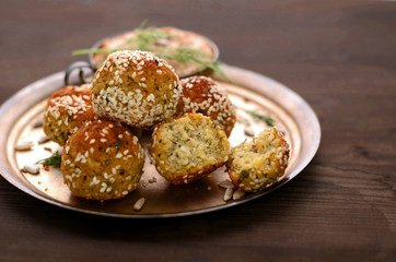 falafel with salad on copper plate