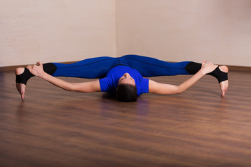Fototapeta na wymiar Woman practicing yoga