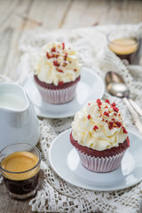 Red velvet cupcakes with buttercream frosting