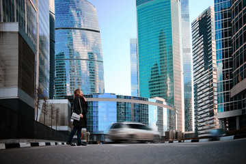 young woman dreaming in the city outside of the winter