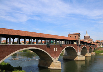Fototapeta na wymiar covered bridge over the TICINO River in Pavia