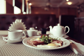 cup of tea or coffee in a cafe serving breakfast table