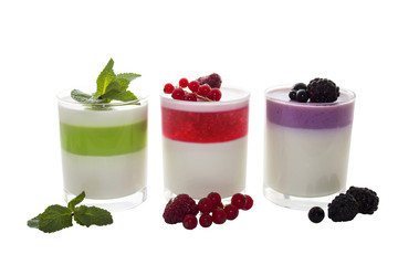 Panna cotta with red, green and violet jam