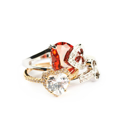 Pile of heart shaped rings isolated