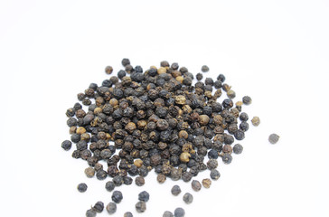Black peppers insolated on white background