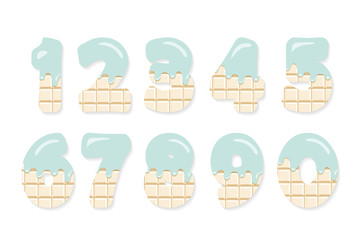 Cute numbers set for birthday design. White chocolate with melted pastel blue cream.
