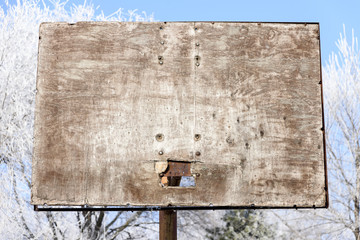 Basketball court with old boards and hoops