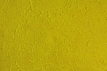 Handmade recycled yellow paper for texture and background.