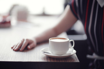 adult girl in a cafe