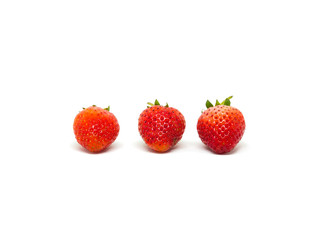 Group of fresh strawberries isolated on white background.