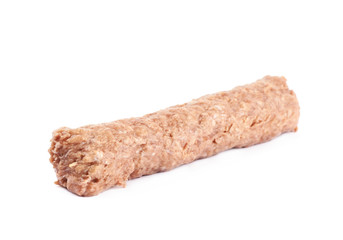 Raw kebab meat on a stick