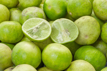 Fresh lime fruit sour taste with a half