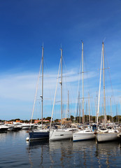 Fototapeta na wymiar sailing boats in the marina of Hyères - France