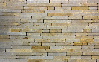 Wall of Indian sandstone with a beautiful structure, decorative building facing material