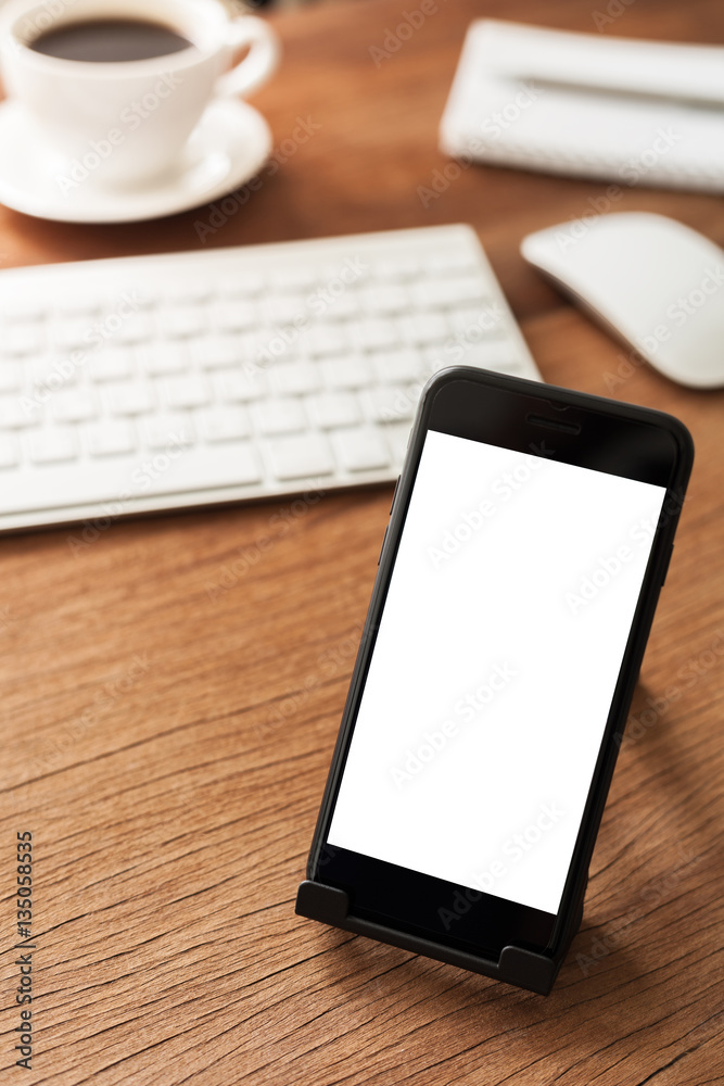 Poster phone mobile on table showing blank screen