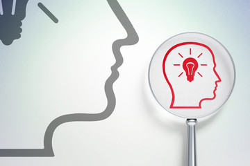 Advertising concept:  Head With Lightbulb with optical glass on digital background