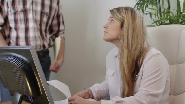 Boss berating female employee at corporate job