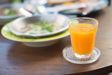 Orange juice on table close-up