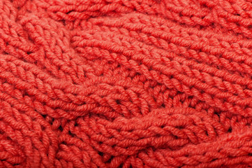Background of red knitted fabric.