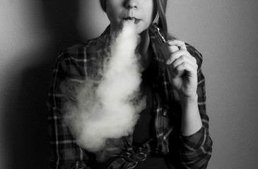 vape (e-cigarette, electronic cigarette) girl in black and white