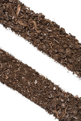 Fertile soil texture background seen from above, top view. Gardening or planting concept.