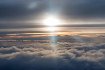 Fototapeta na wymiar Sunrise skyscape viewed from airplane