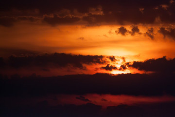 Fototapeta na wymiar Dramatic cloudy sunrise