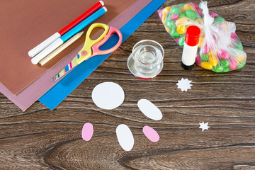 The child cuts out details Easter greeting card packaging paper