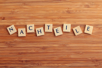 Wort Nachteile aus Holzbuchstaben 