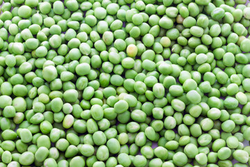 Fototapeta na wymiar Bunch of biologic delicious green peas