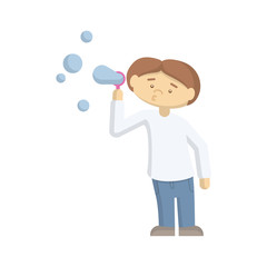 Funny boy playing on the playground with soap bubble