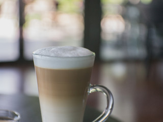 Coffee cup on a table.
