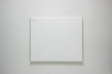 blank canvas on wall - obrazy, fototapety, plakaty