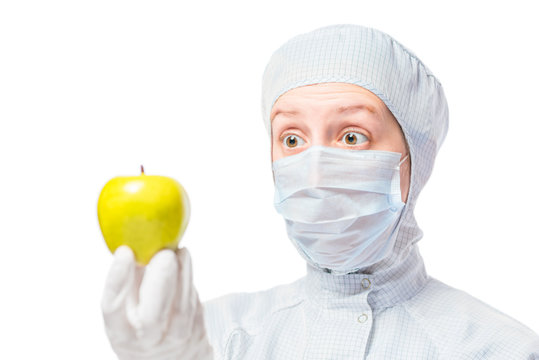 surprised look laboratory biologist with apple in hand isolated
