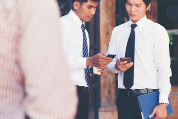 Two businessmen were happy to see a profit from doing business