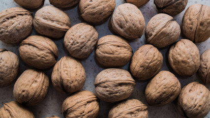 Background of walnuts. Fresh walnuts