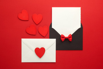 Envelope Mail, Heart and Ribbon on red Background. Valentine Day Card, Love or Wedding Greeting Concept. Top view