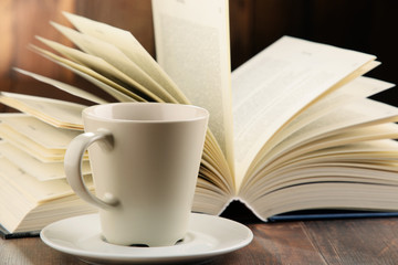 Composition with books and cup of coffee