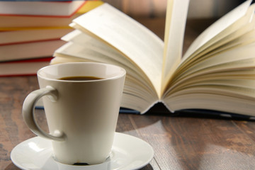 Composition with books and cup of coffee