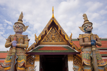 Fototapeta premium Giant demons at the entrance of the Wat Phra Kaew in Bangkok Thailand 