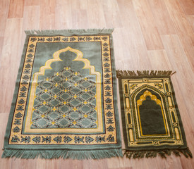Two mat for prayer. Adult and children.