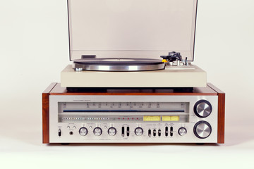 Obraz premium Vintage Stereo Radio Receiver with Record Player Turntable Set