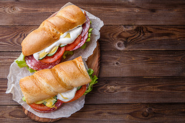 Appetizing bread with sausage , vegetables