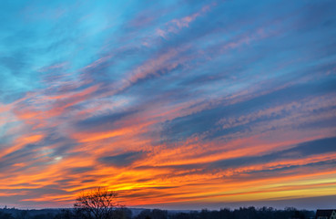 Bright colorful sunset with clouds on the horizon