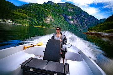 Woman driving a motor boat