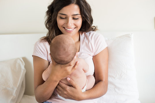 Mother holding newborn baby